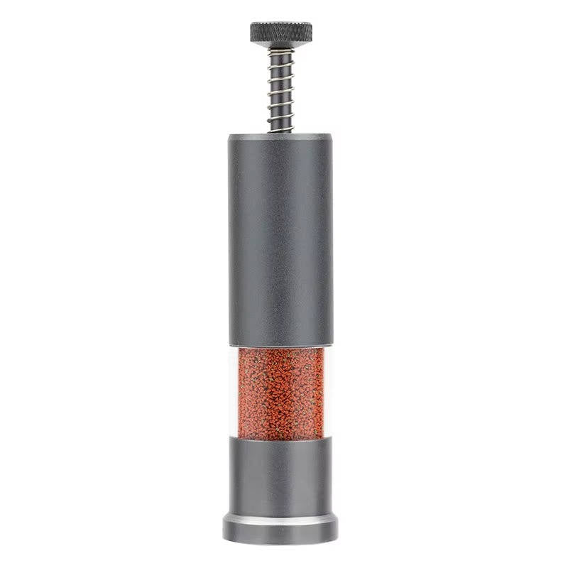 Automatic fish food dispenser for small aquariums, featuring a sleek aluminum build and compact size