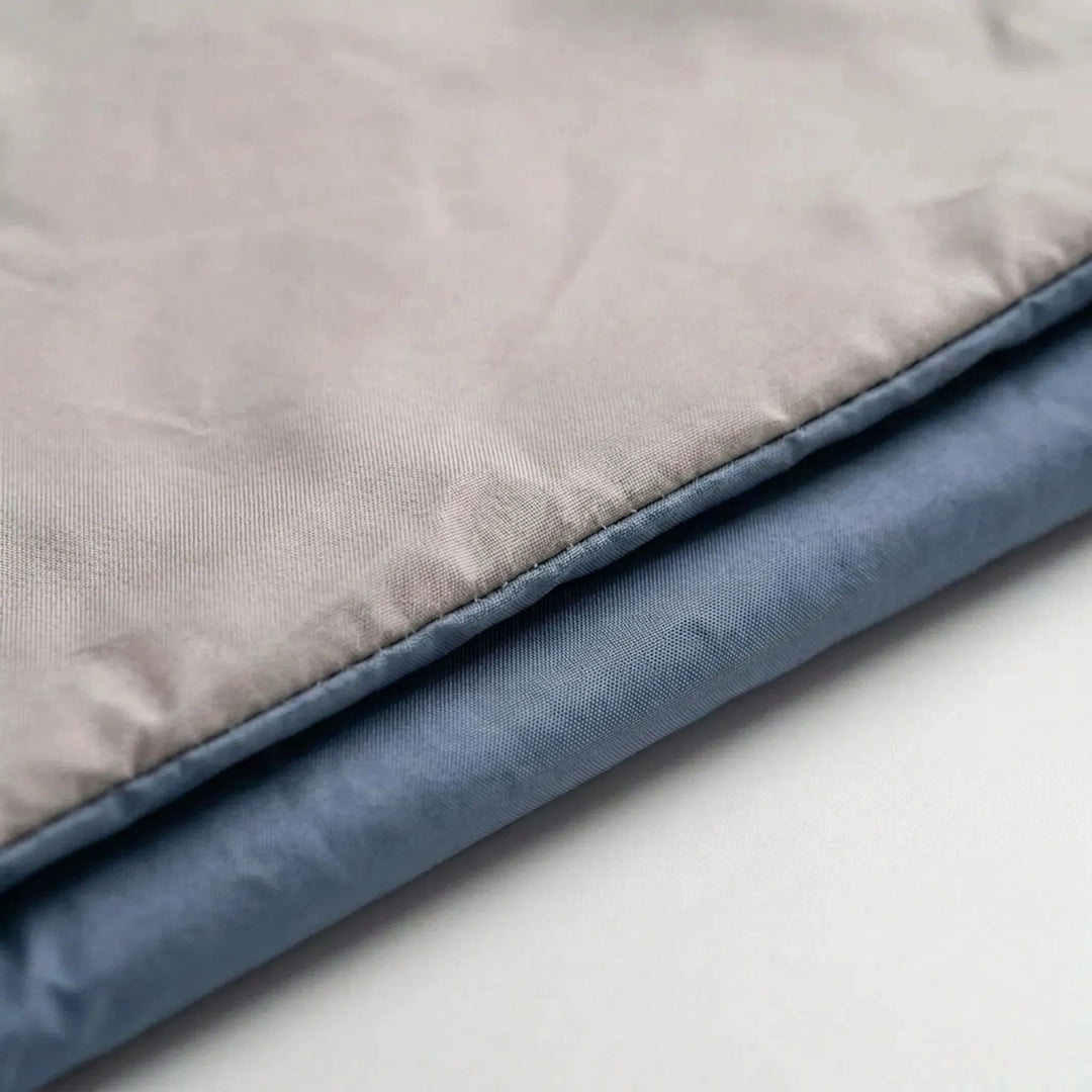 Brown compact sleeping bag for summer camping, perfect for lightweight outdoor travel.