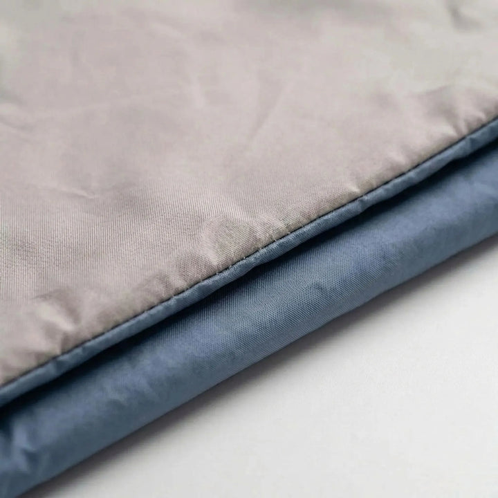 Brown compact sleeping bag for summer camping, perfect for lightweight outdoor travel.