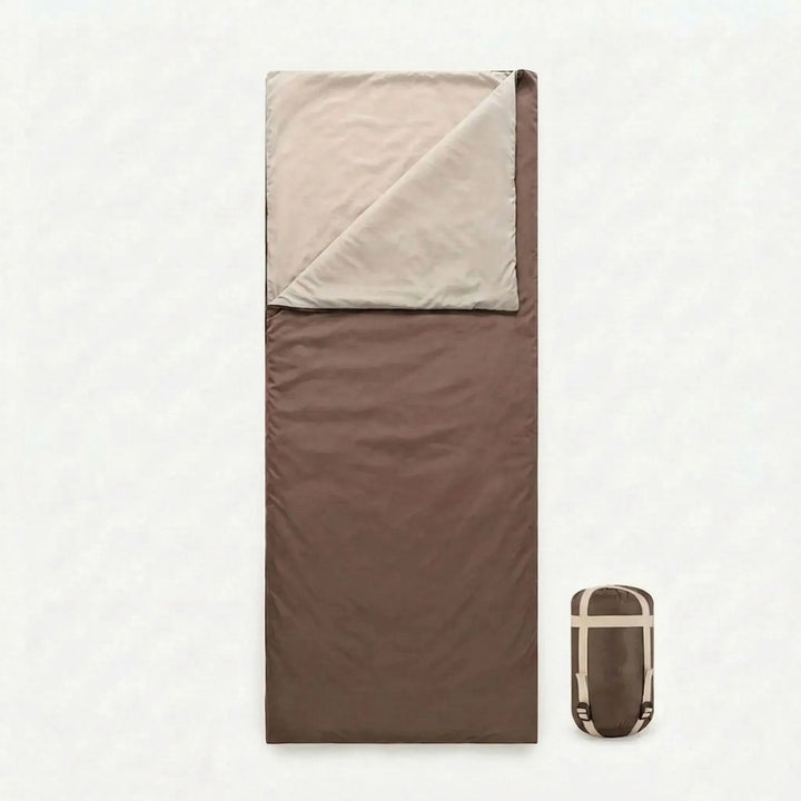 Versatile compact brown sleeping bag for summer camping, hiking, and spring outdoor adventures.