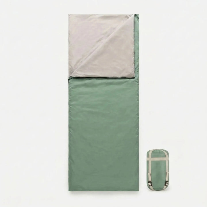 Portable lightweight brown sleeping bag, perfect for summer camping, hiking, and travel.