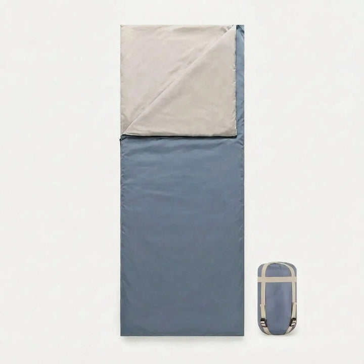 Hiking and camping lightweight brown sleeping bag, compact for summer outdoor travel.