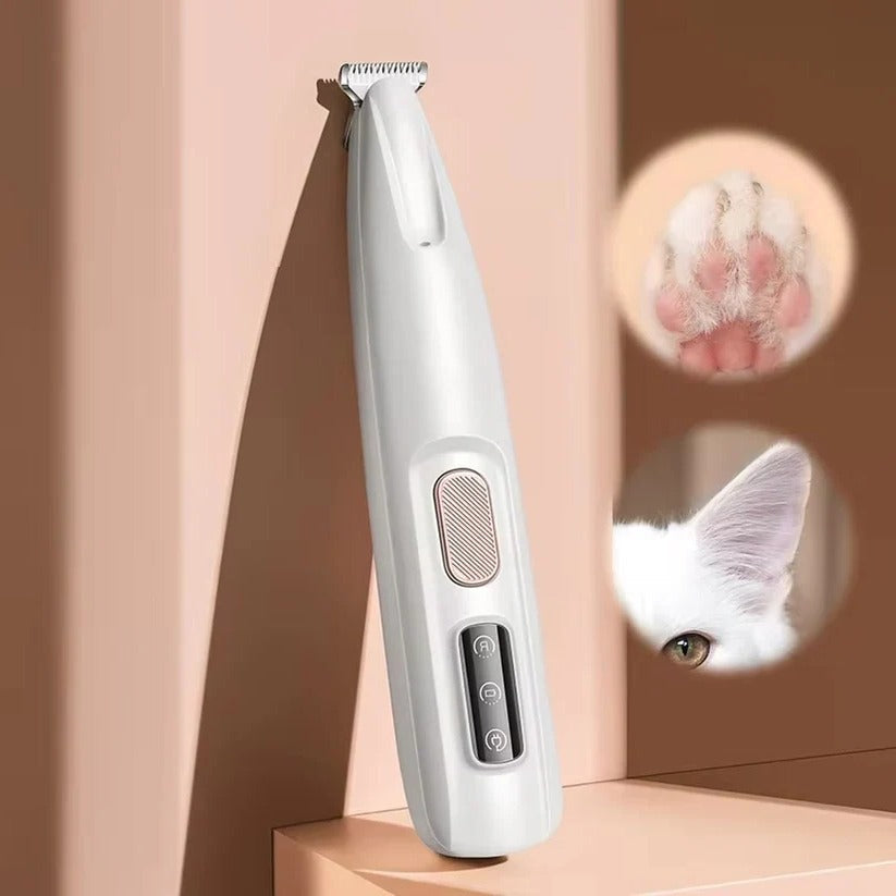 Rechargeable pet grooming tool, ergonomic design for sensitive area trimming on pets.