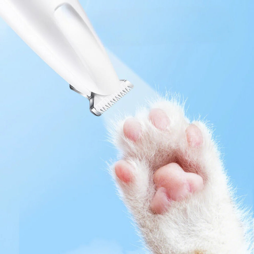 Handheld pet trimmer for dogs and cats, features quiet operation for stress-free grooming.