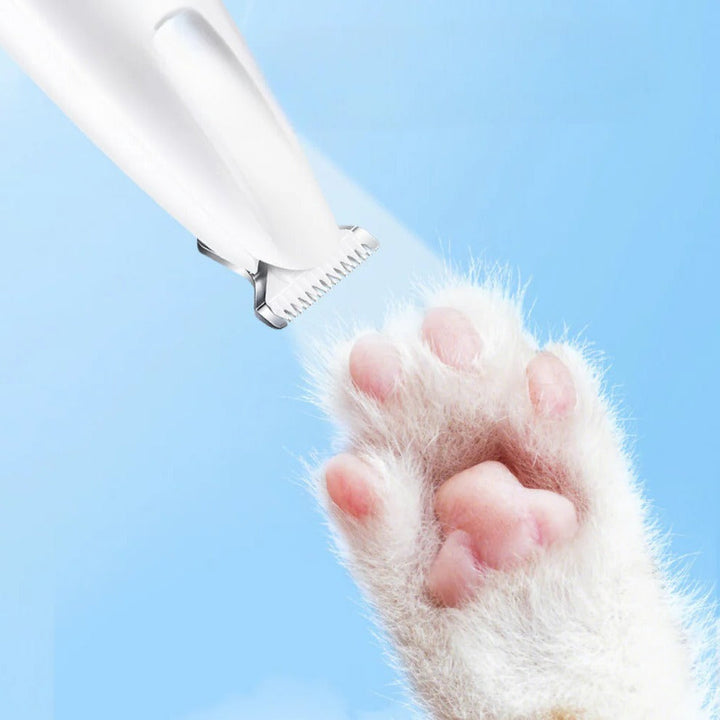 Handheld pet trimmer for dogs and cats, features quiet operation for stress-free grooming.