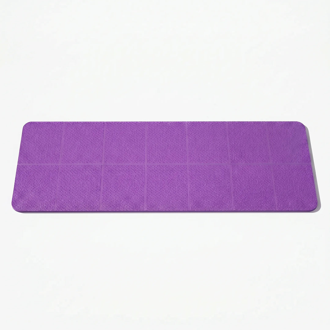 Lightweight unisex travel yoga mat, perfectly folded for easy portability & daily exercise.