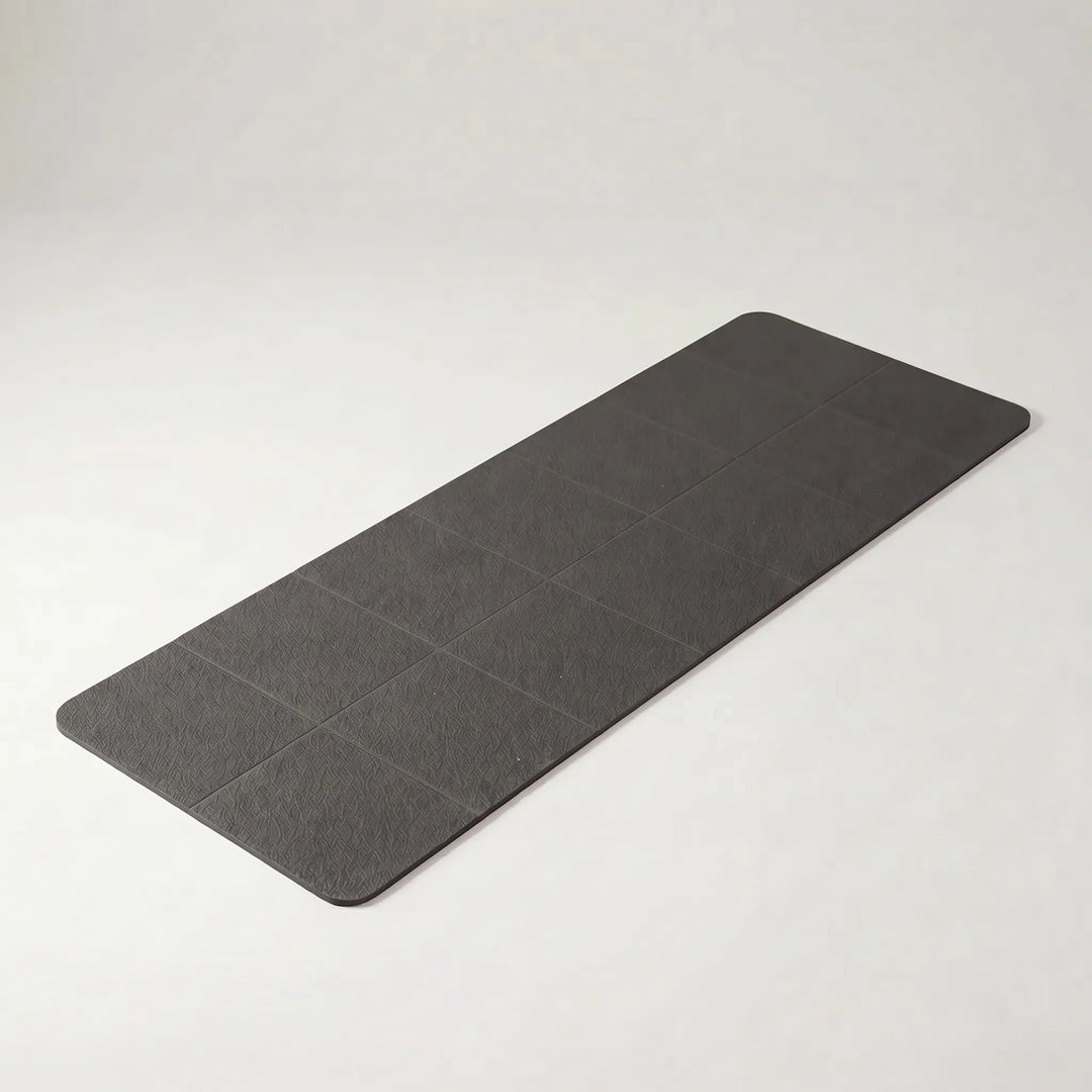 High-quality TPE foldable travel yoga mat, offering comfortable support for all levels of pilates & exercise.