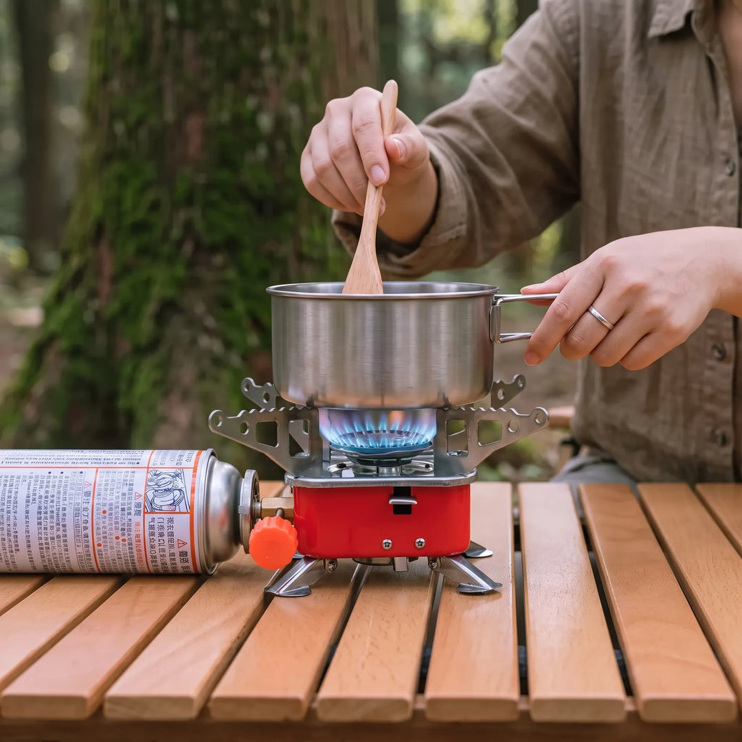 Durable iron camping stove for reliable outdoor cooking. Perfect portable camp kitchen gear for adventurers.