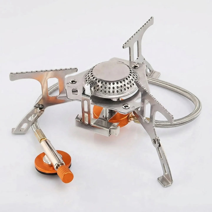 Folding gas camping stove for quick outdoor meals. Compact & easy-to-pack camp gear for hiking & backpacking.
