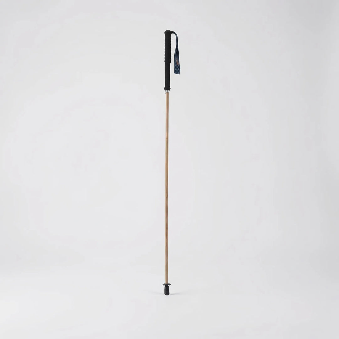 Durable folding trekking pole, compact design for easy transport on any hiking trail or walk.