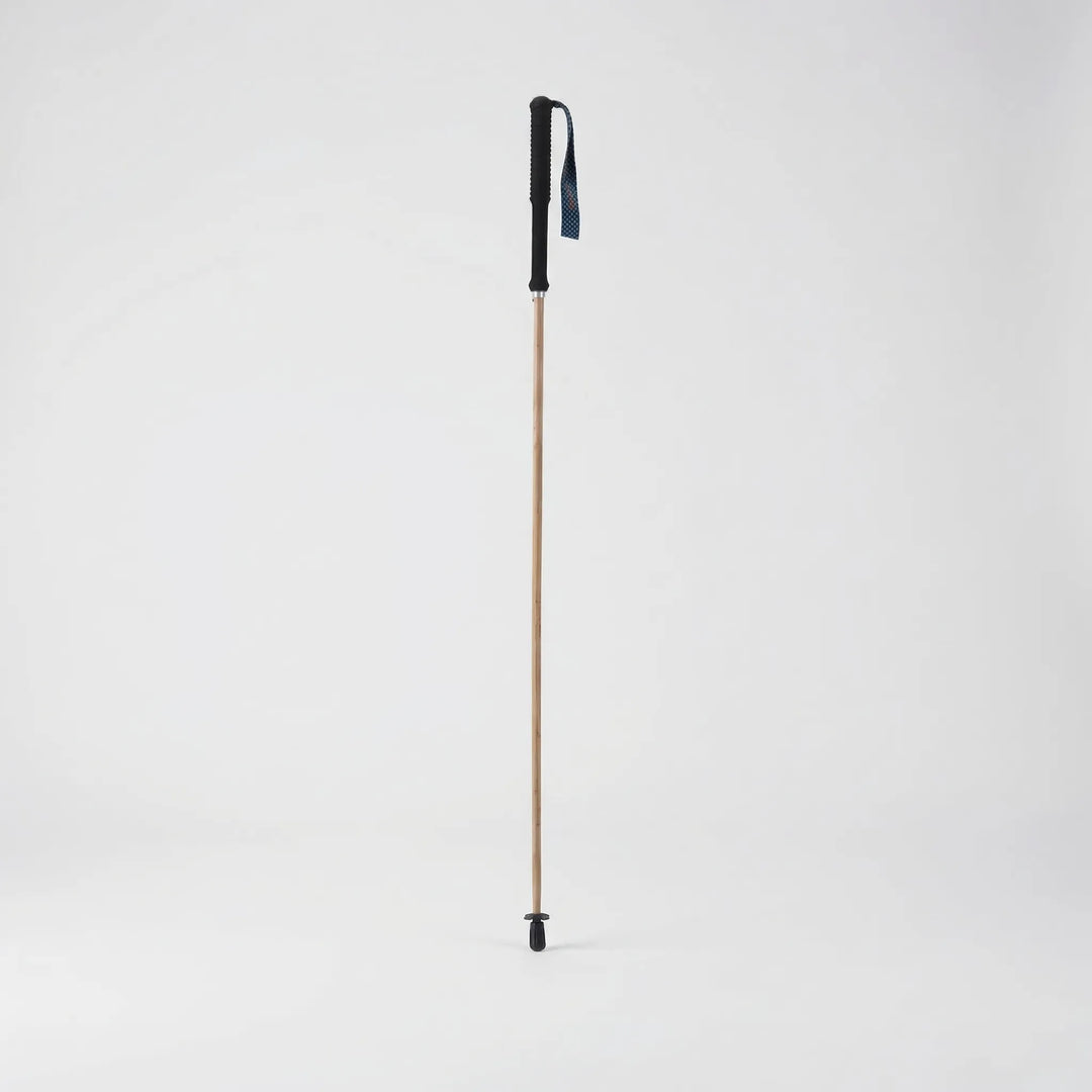 Unisex compact folding pole for versatile trekking, hiking, and walking support on diverse terrain.