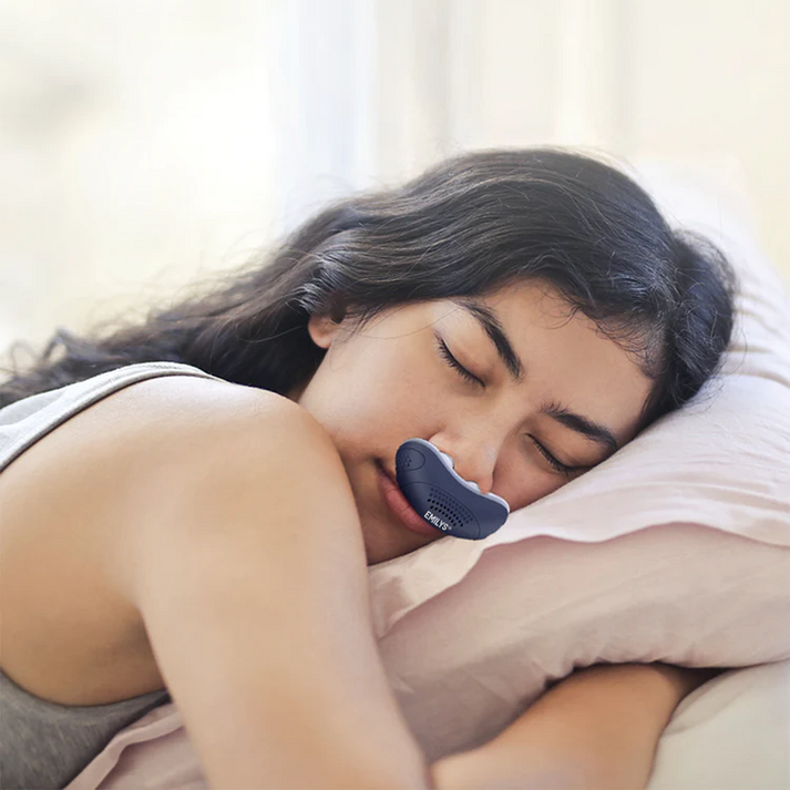 Advanced micro CPAP device for sleep apnea & snoring, featuring a sleek, hoseless, and portable design.