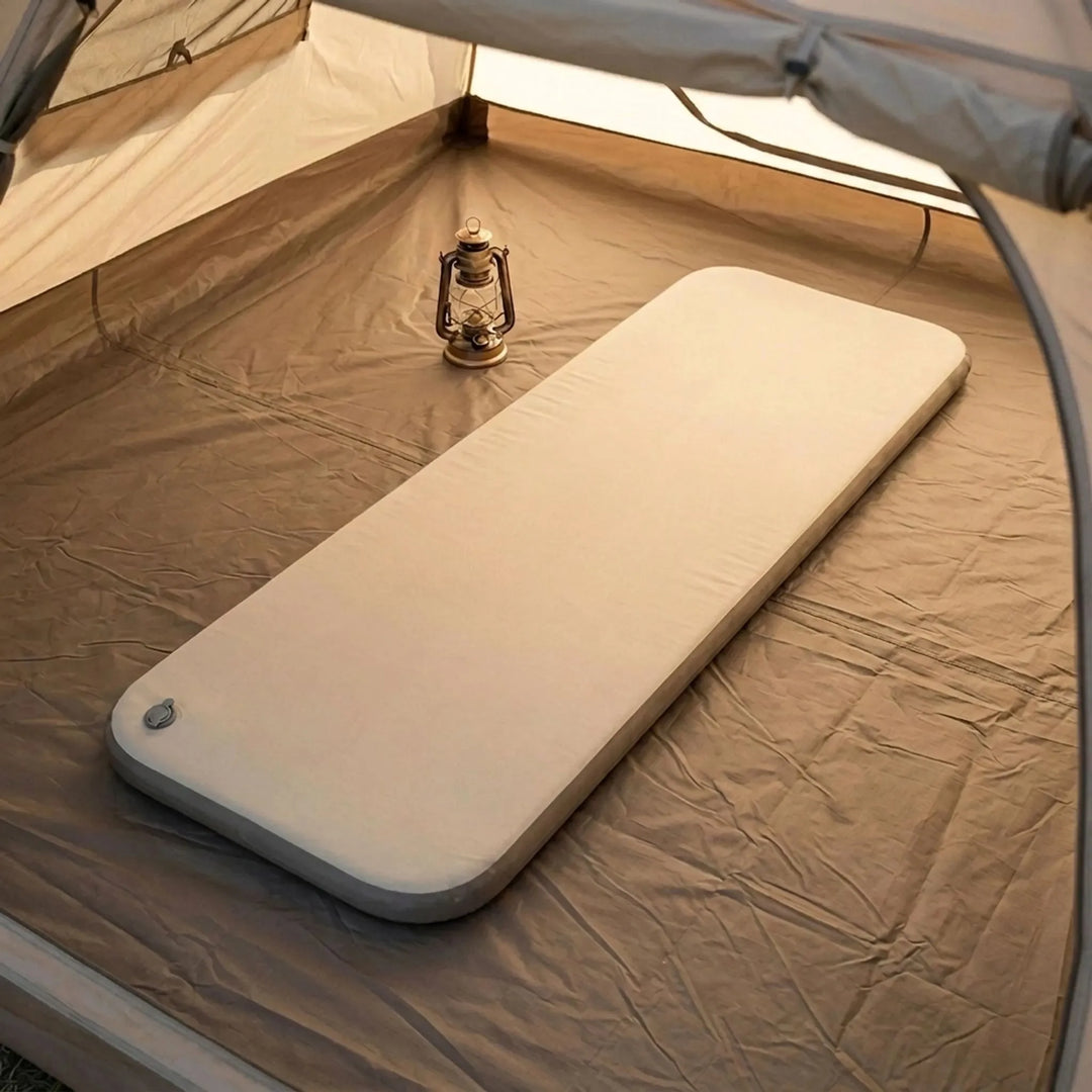 Compact inflatable camping air mattress, perfect for hiking & travel. Lightweight outdoor sleep pad.