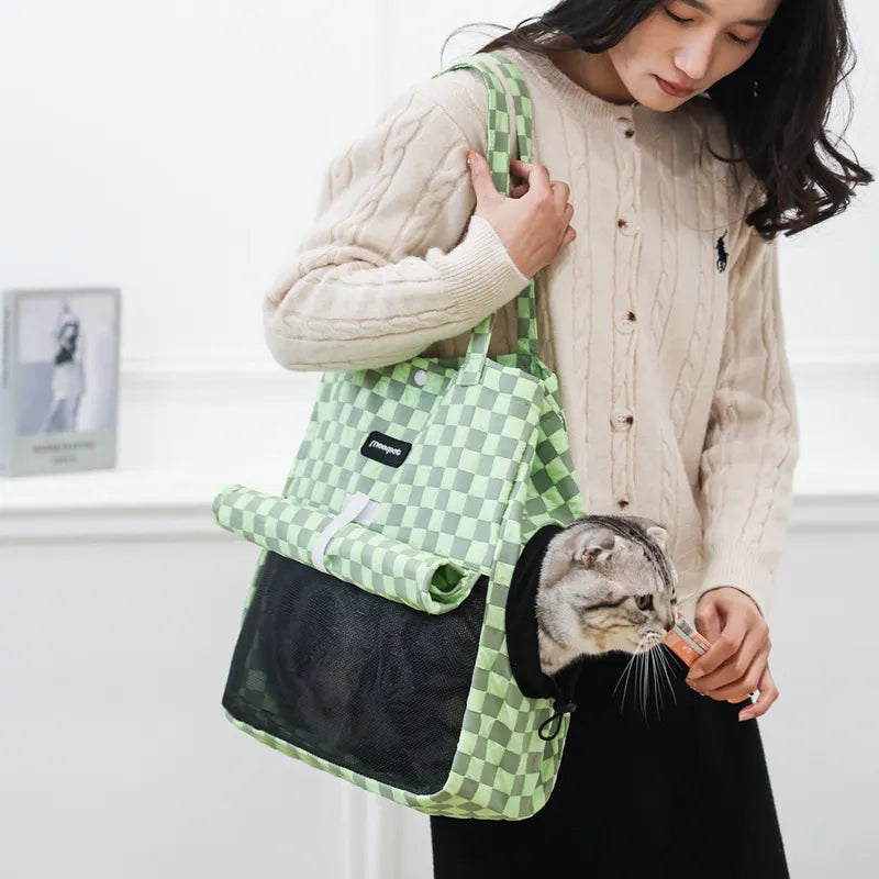 Compact pet carrier bag for small dogs and cats, ideal for car travel
