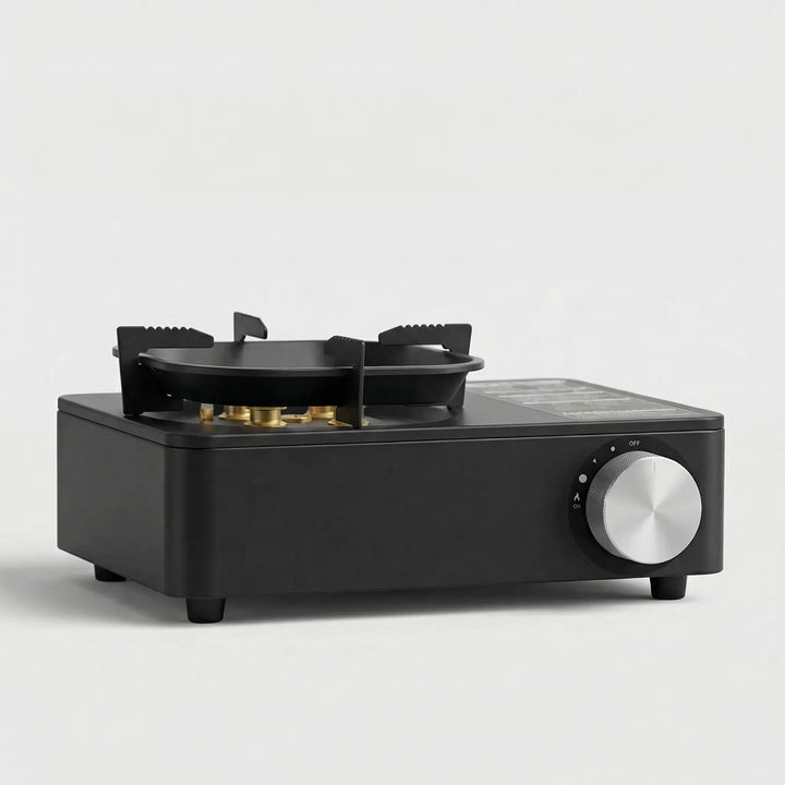 Sleek black portable butane camping stove with sturdy pot support. Ideal single burner for camp kitchen outdoor cooking.