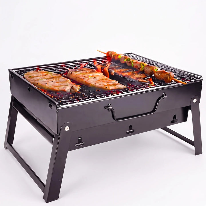 Durable steel portable charcoal grill, designed for outdoor cooking, camping, and beach picnics.