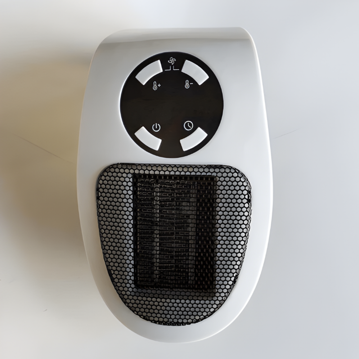 Energy-efficient mini electric personal heater with digital display, perfect for targeted warmth in office or small rooms.