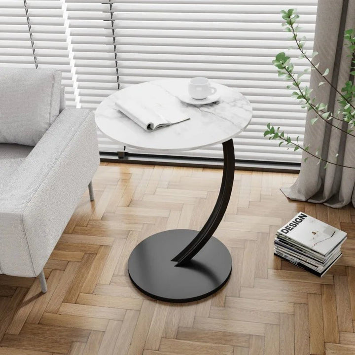 Functional small round side table, ideal for compact living room decor.