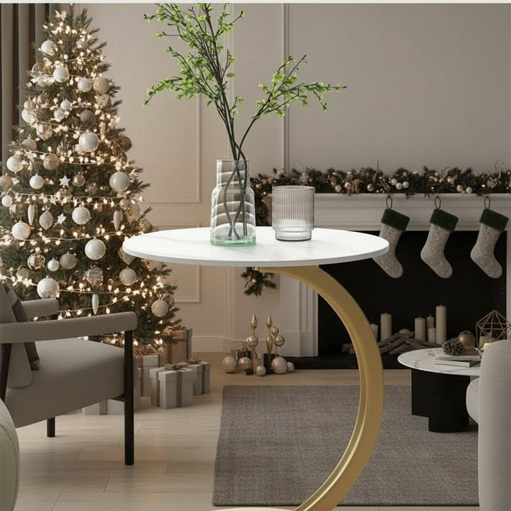 Modern compact round end table, ideal for small apartments and living areas.
