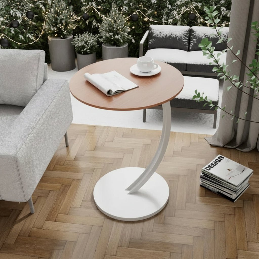Sleek round living room side table, minimalist and functional design.