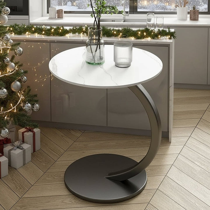 Contemporary compact round table, perfect home accessory for any room.
