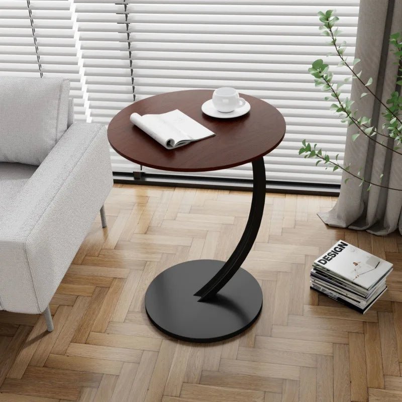 Modern compact round side table, great for space-saving furniture needs.