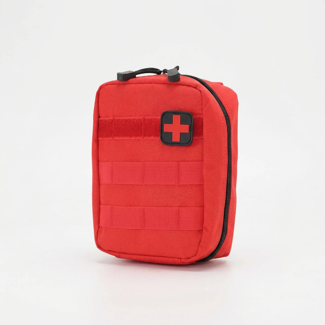 Easy-access compact first-aid pouch for essential emergency medical supplies on hikes, travel, or outdoor adventures.
