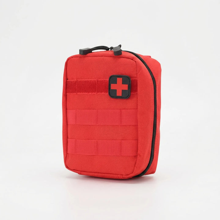 Easy-access compact first-aid pouch for essential emergency medical supplies on hikes, travel, or outdoor adventures.