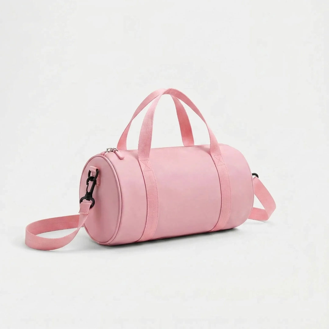 Small cylindrical unisex gym duffel bag, perfect for daily essentials, travel, and fitness workouts.