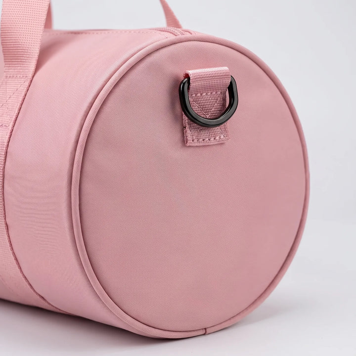 Durable nylon compact gym bag, unisex design. Ideal duffel for daily essentials, sport, and travel.