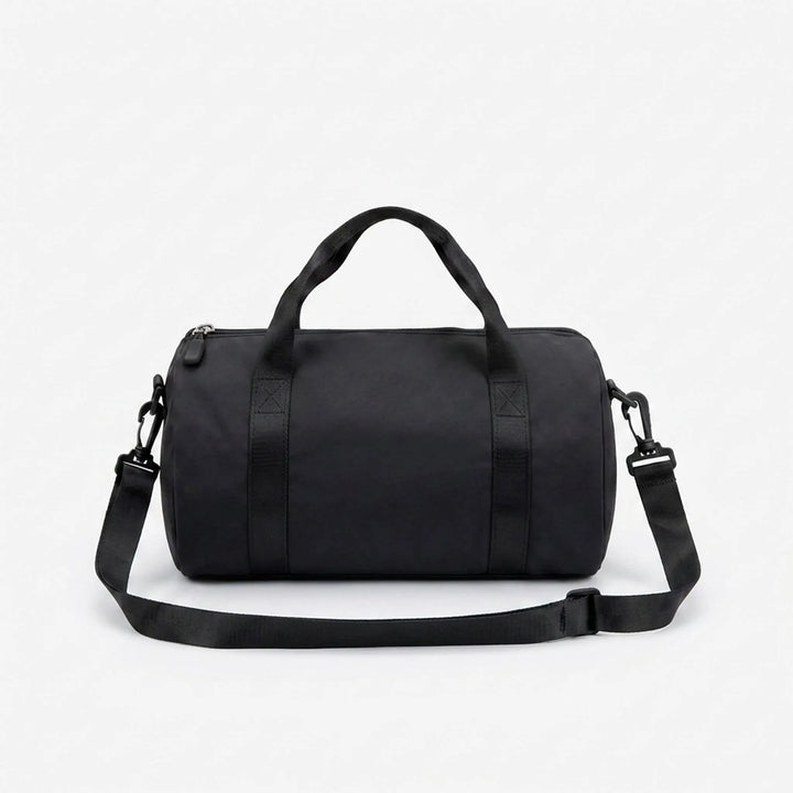 Unisex compact gym bag for active lifestyles, carrying fitness essentials, sport gear, and daily items.