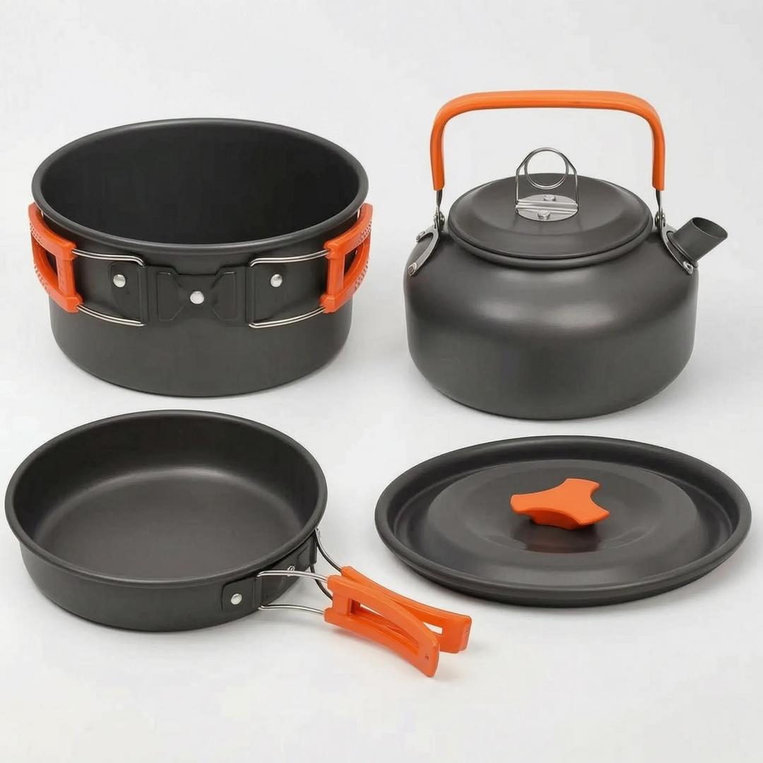 Multi-piece camping cookware set, designed for compact storage and efficient outdoor cooking on hikes.