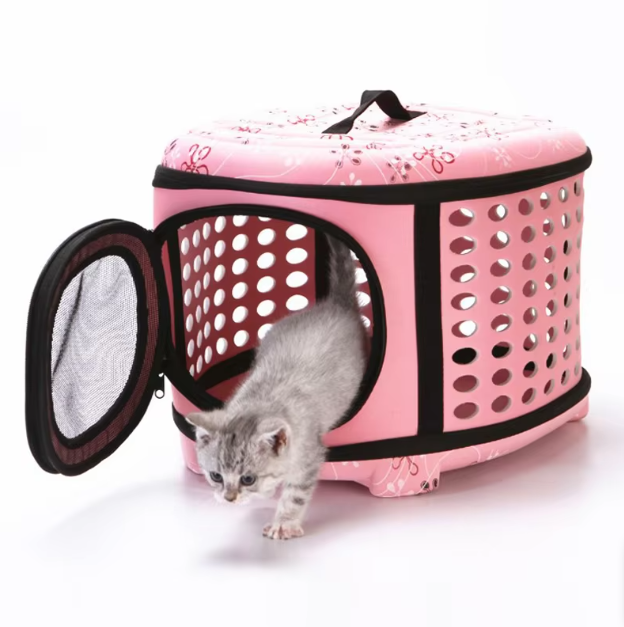 Compact ventilated pet carrier for small cats and dogs, black, side view