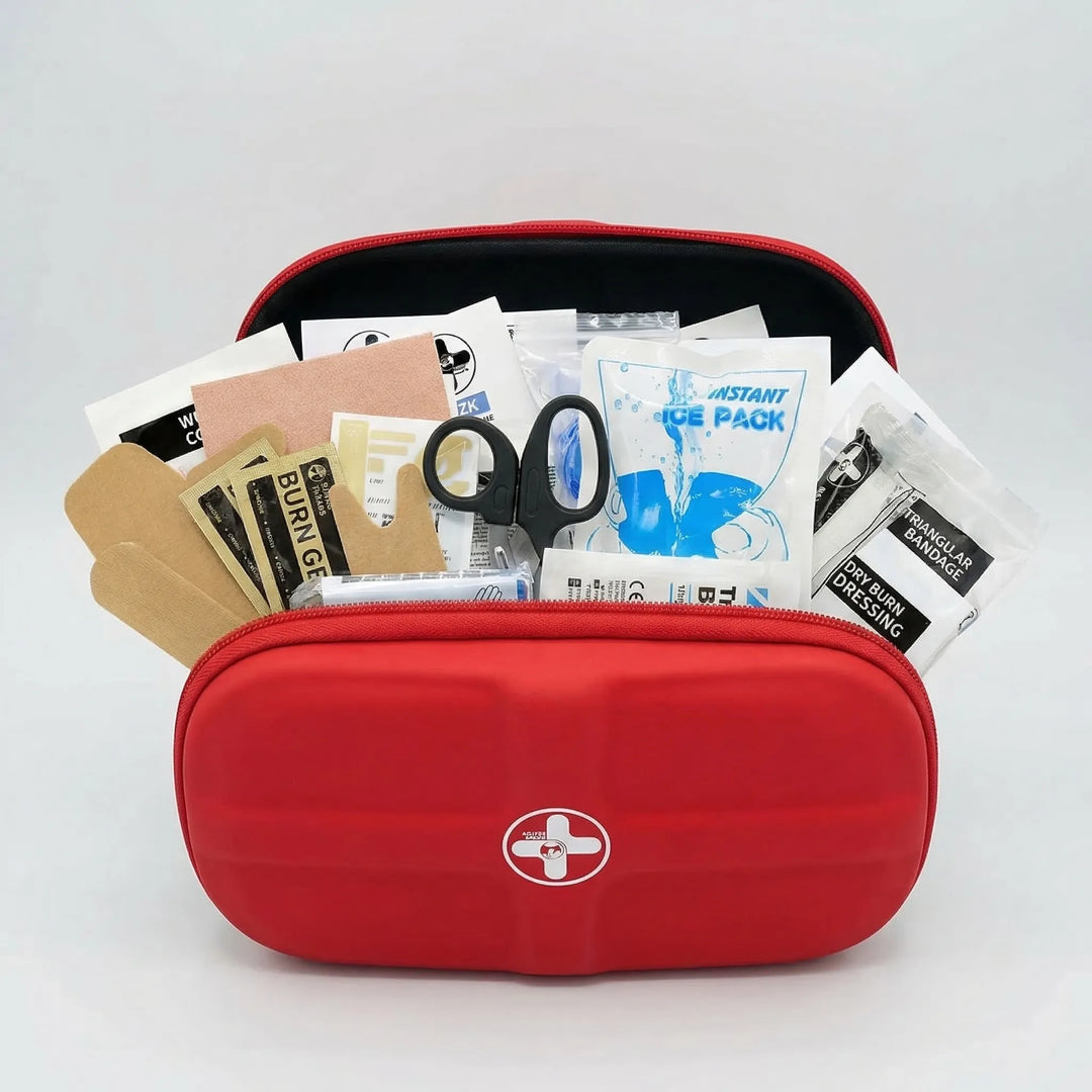 Portable emergency first aid kit, waterproof & compact for survival readiness.