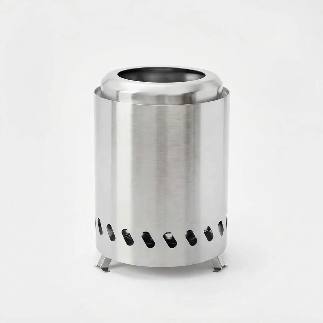 Compact wood burning camping stove for outdoor cooking. Durable stainless steel, essential for hiking & survival.