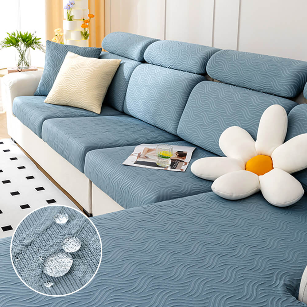 Cooling water-resistant antifouling stretch sofa cover in a light gray on a three-seater couch