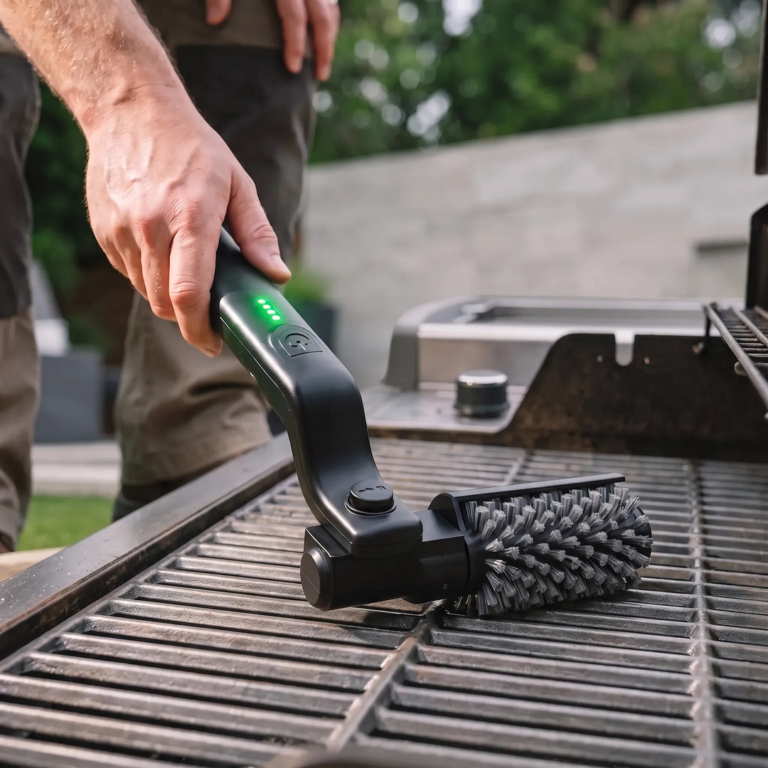 Cordless electric grill brush for powerful, easy BBQ grate cleaning, perfect for outdoor cooking.