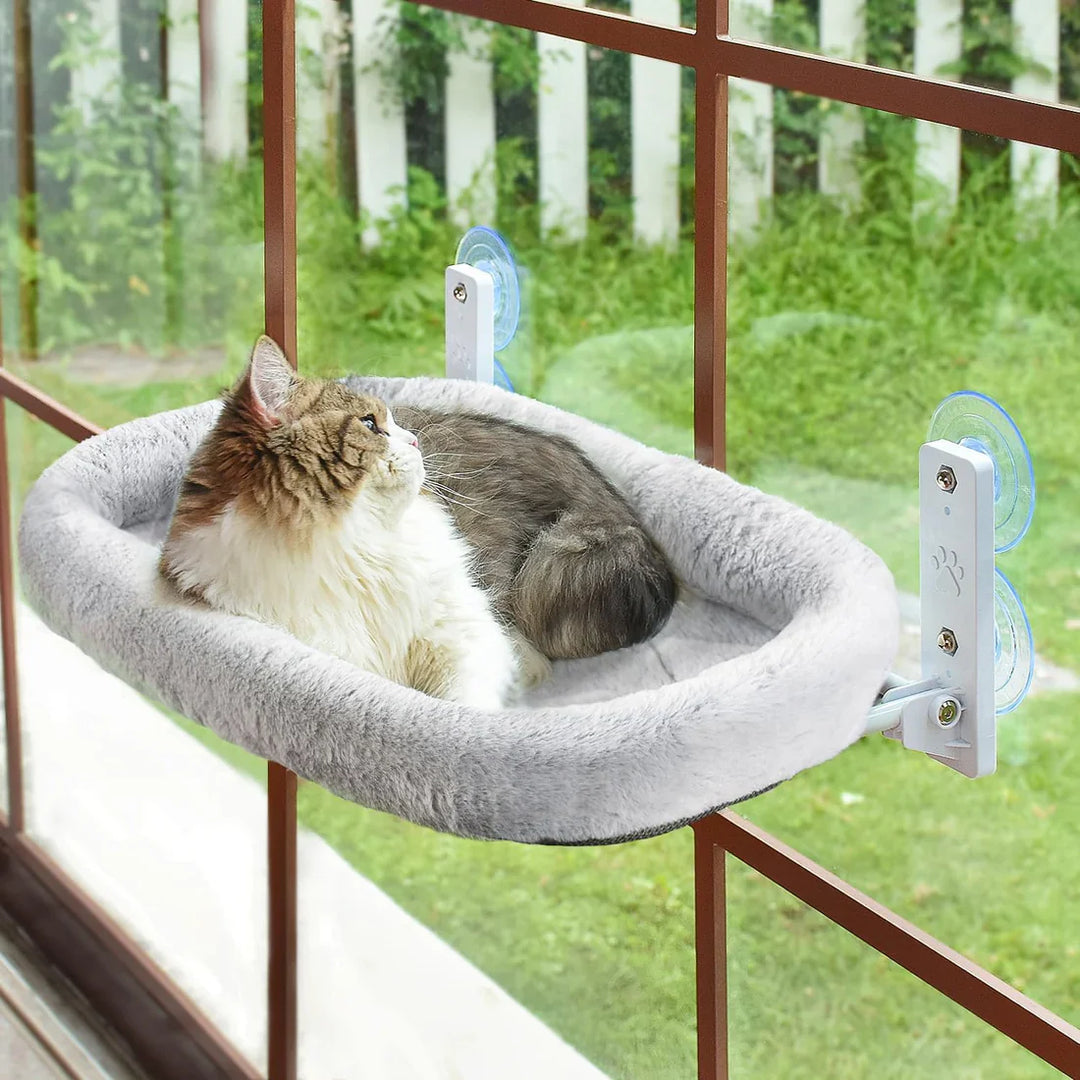 Cordless gray cat window perch, modern pet furniture for sunbathing and lounging, easily attaches to window.