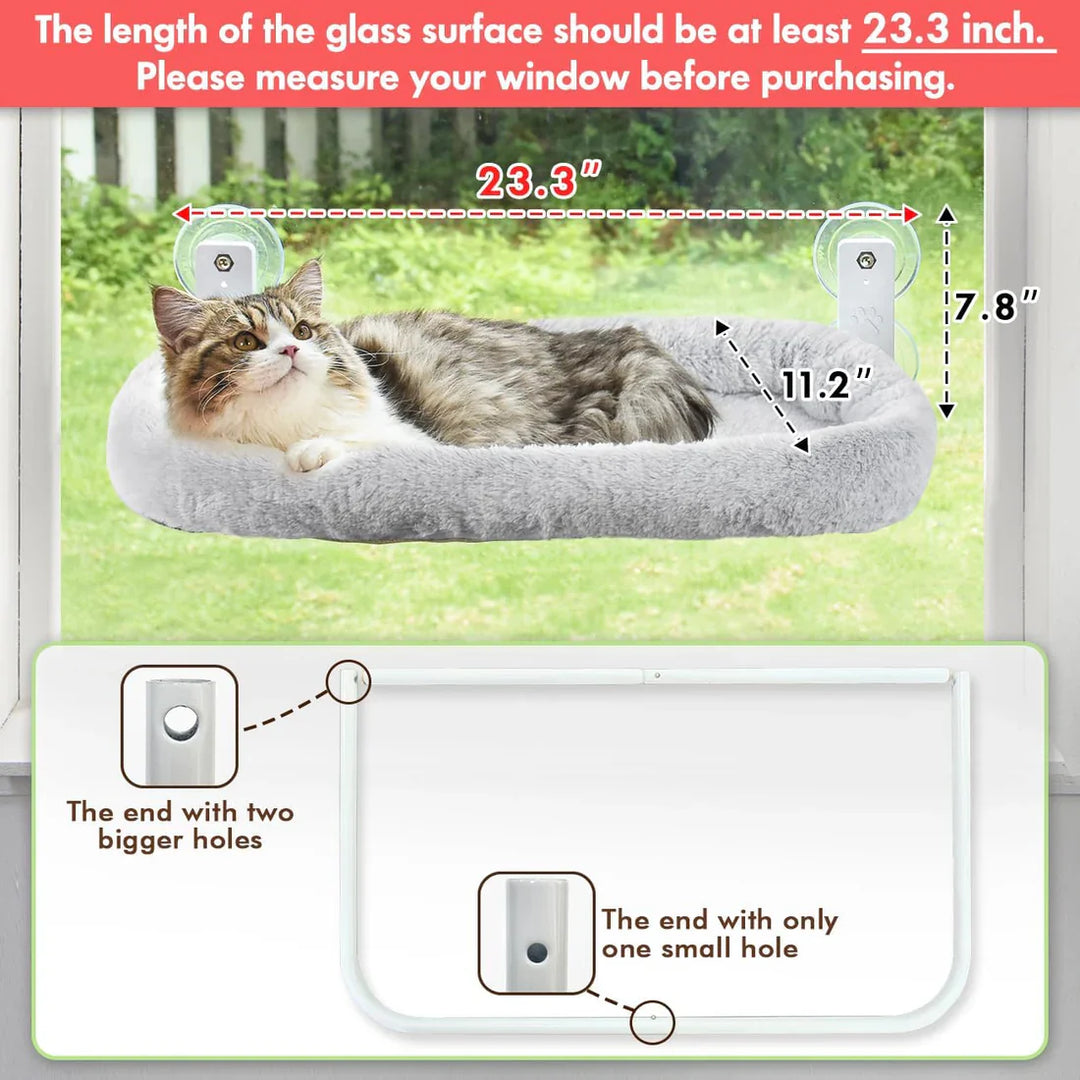 White, cordless cat window perch with plush cushion, ideal pet bed for cats to sunbathe and relax.