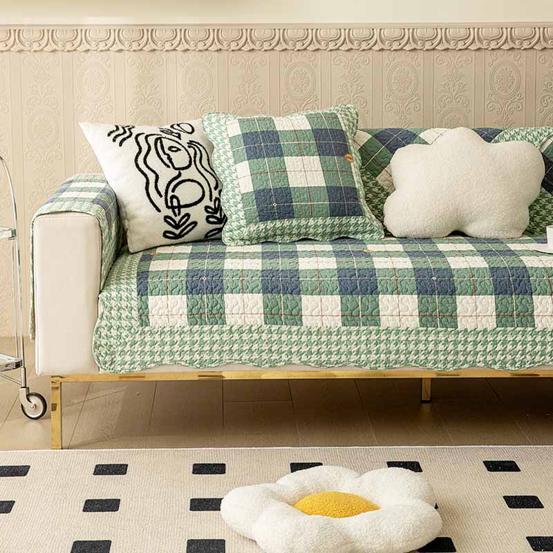 Pet-friendly cotton plaid sofa cover, non-slip design for scratch protection, machine washable home decor.