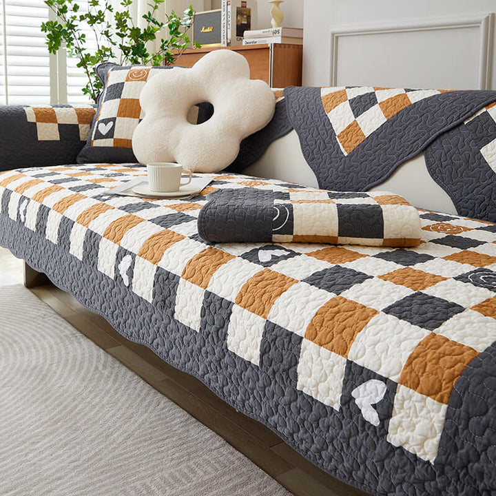 Anti-scratch cotton plaid sofa protector, featuring non-slip backing for pet-friendly home decor.
