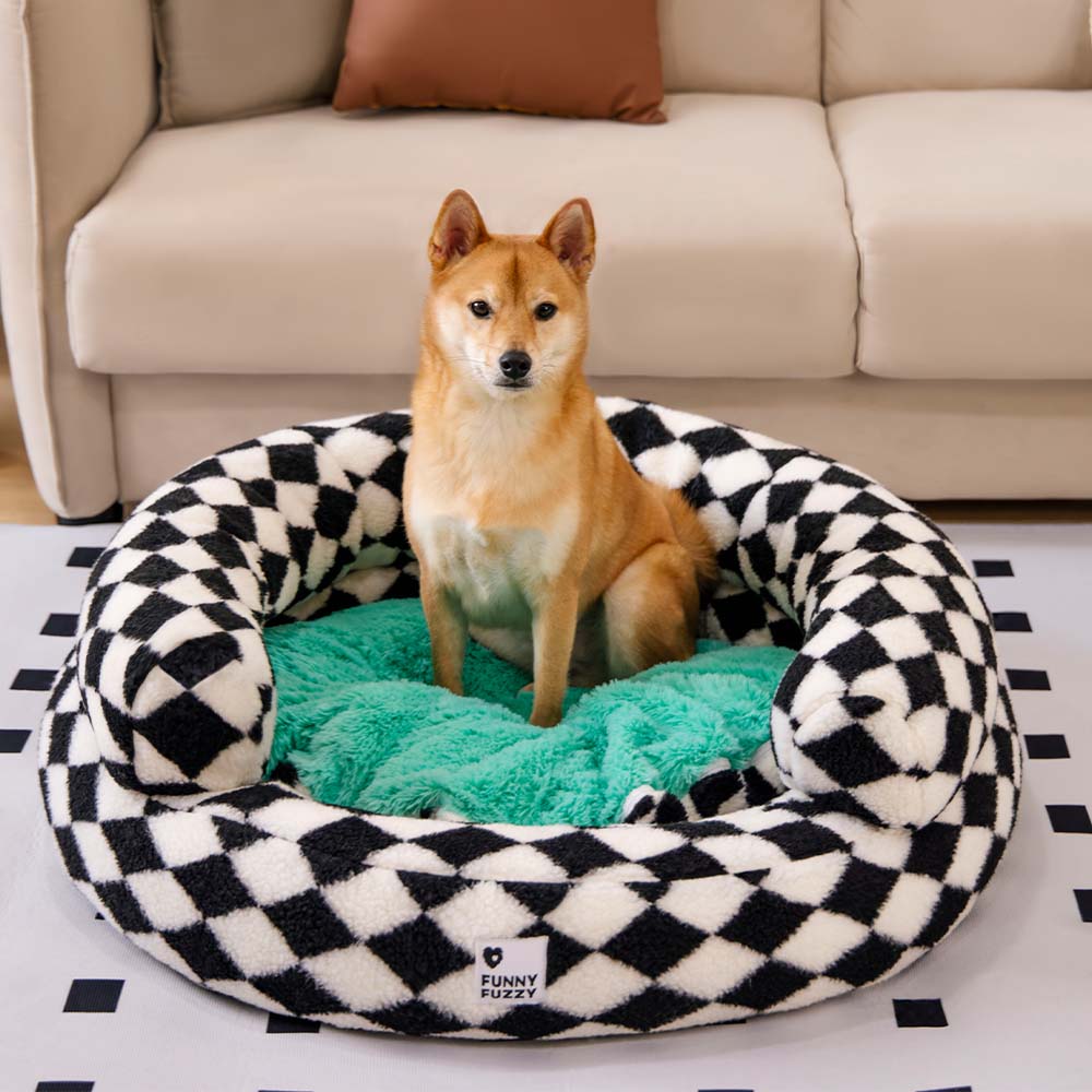 Orthopedic argyle donut dog bed, designed for joint support and pet comfort.