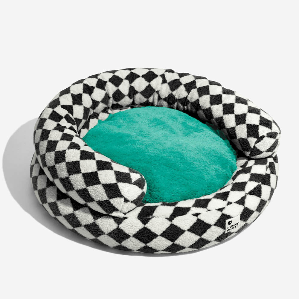 Modern argyle washable pet bed, donut shape, a comfortable spot for any dog.