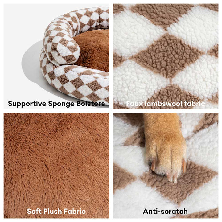 Soft argyle pet bed with a raised donut shape, providing head and neck support.