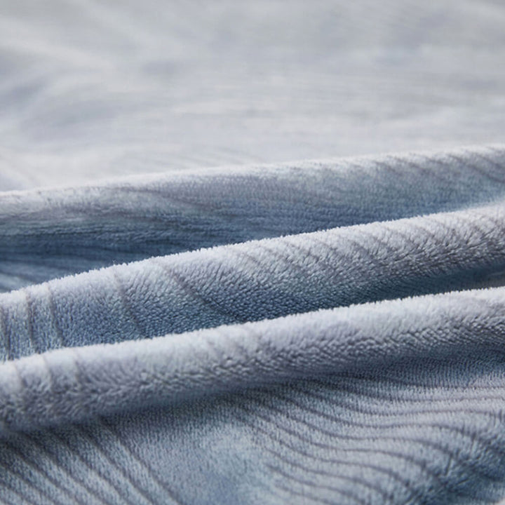 Milk velvet bed sheet set, botanical design, offering a soft, snug experience.