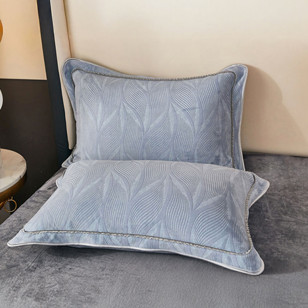 Plush milk velvet bed sheet set, botanical print, enhancing bedroom decor.