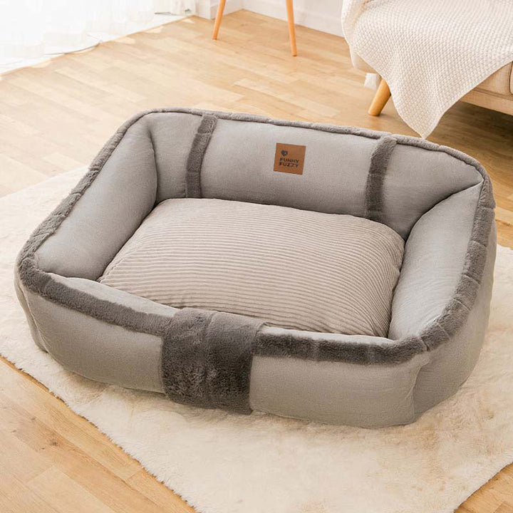 Washable calming pet bed, a stylish grey sofa bed addition to any pet-friendly home.