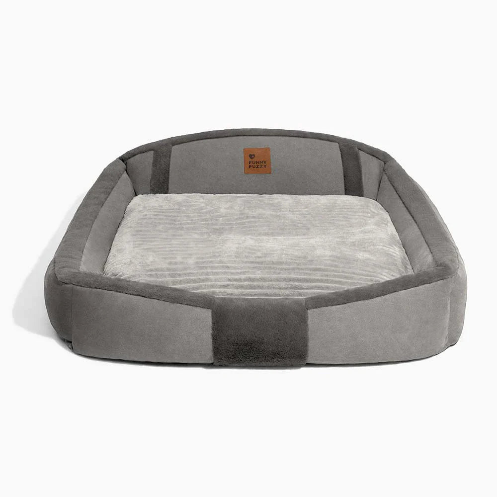 Calming dog bed for large dogs, substantial raised support and plush comfort, anxiety relief.