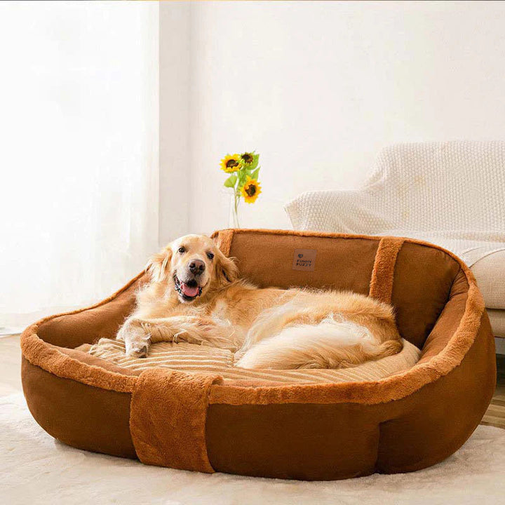 Beige calming sofa dog bed, washable plush pet bed, providing cozy support for small dogs.