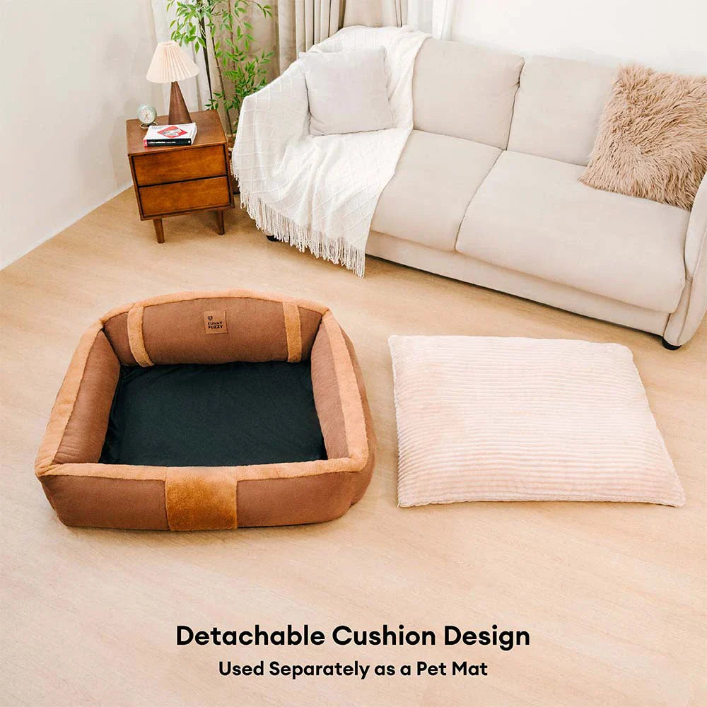 Washable anxiety relief dog bed, a cozy sofa bed in a living room setting, pet supplies.